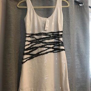 Bebe white and black sequin drrdd